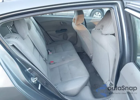 2011 Honda Insight from USA, damaged, VIN JHMZE2H31BS010819